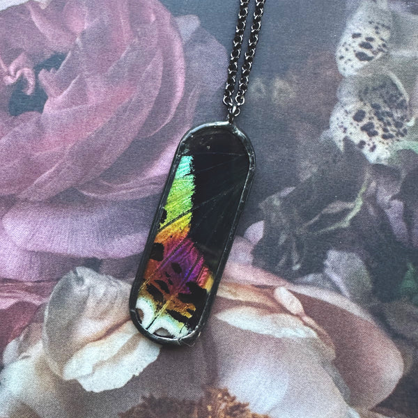 Rainbow Sunset Moth Oval Portal Pendant