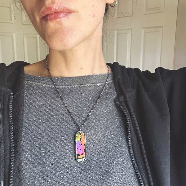 Rainbow Sunset Moth Oval Portal Pendant